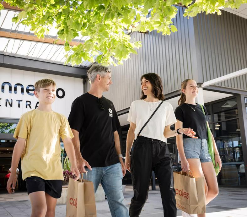 Parents and two children shopping at Wanneroo Central in Wanneroo, Western Australia